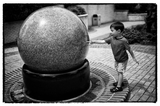 Isaac moves a heavy stone sphere with one hand, Sciworks, Winston-Salem